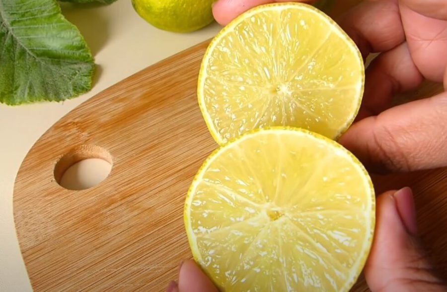 Roll the lemons gently on a hard